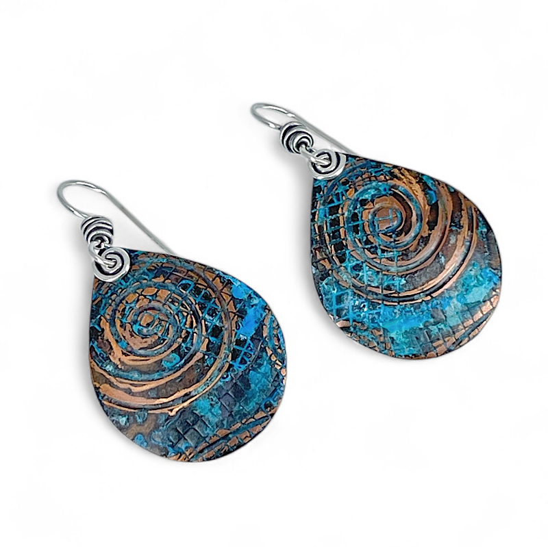 Pair of blue copper earrings with spirals by Kristin Christopher