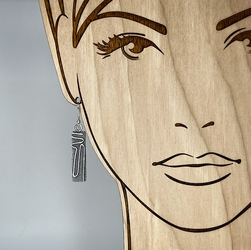 Sterling Silver mod earrings shown on model