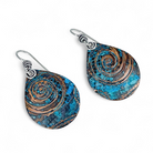 Pair of blue copper earrings with spirals by Kristin Christopher