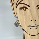 Circle copper earring shown on model