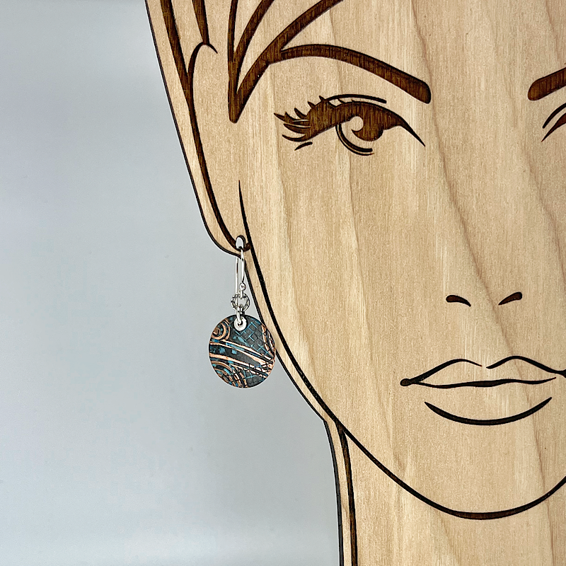 Circle copper earring shown on model