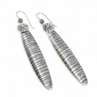 Textural long oval silver earrings by Kristin Christopher
