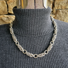 Silver byzantine chainmail necklace on a mannequin.