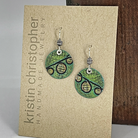 Green and black circular earrings on a card with 'Kristin Christopher Handmade Jewelry' branding.