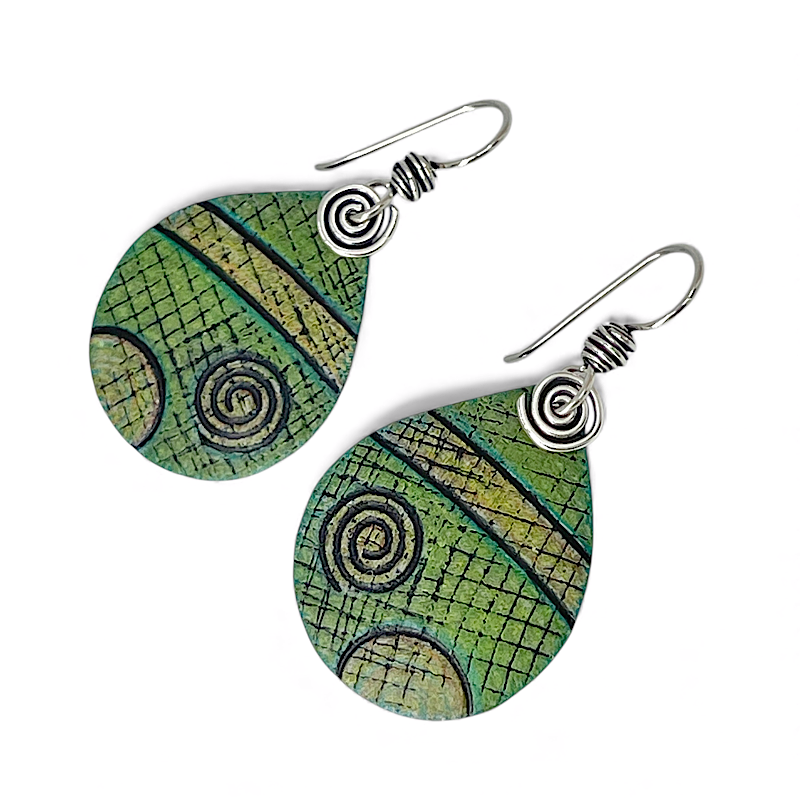 Green spiral patterned earrings with silver hooks on a white background