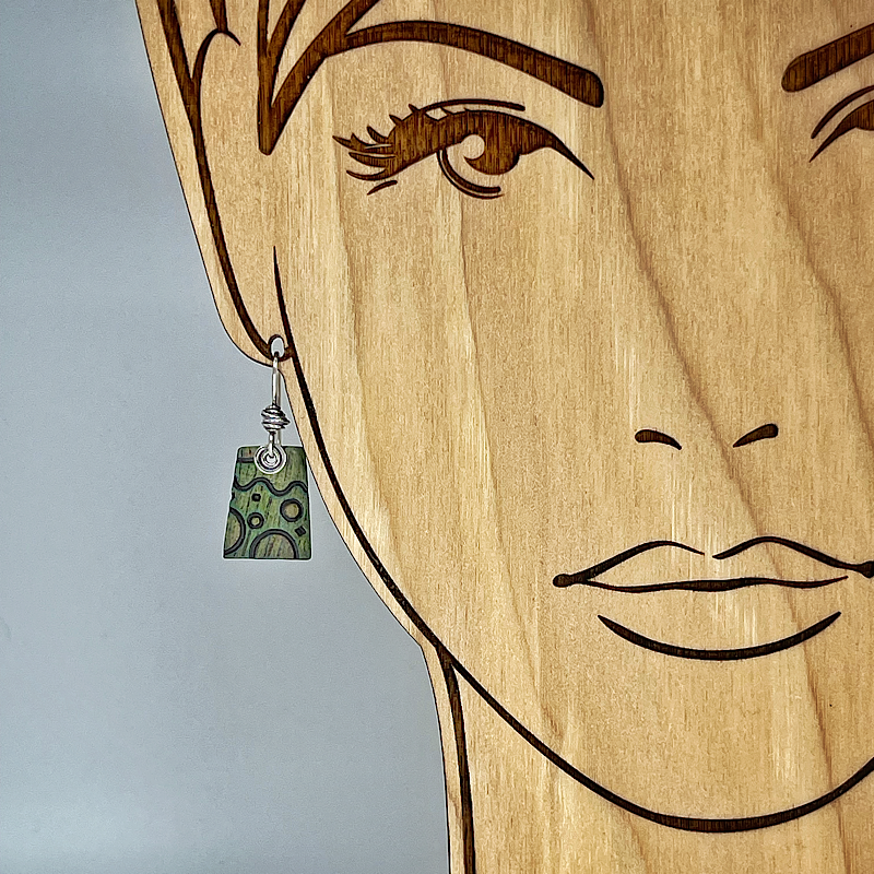 green earring shown on model