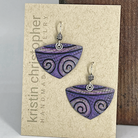 Purple earrings with sterling silver spirals on a Kristin Christopher card