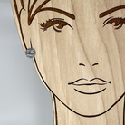 Sterling post earring with silver stripes shown on model