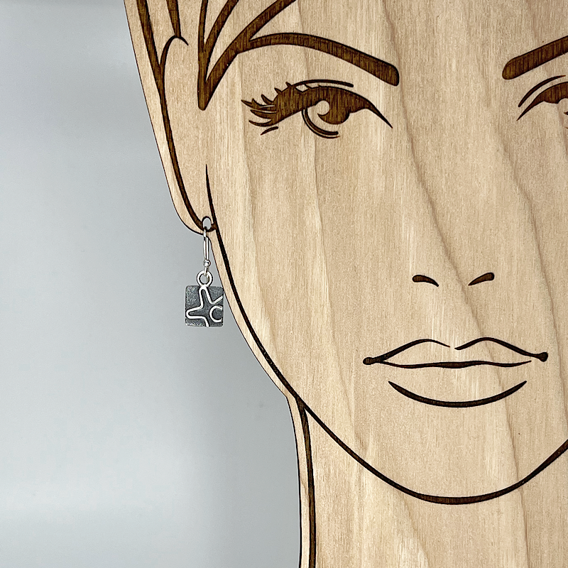 Square sterling silver earring shown on model