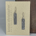 Sterling silver mod earrings on a 'Kristin Christopher Handmade Jewelry' card.