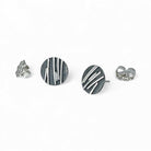 Sterling post earring with silver stripes on white background