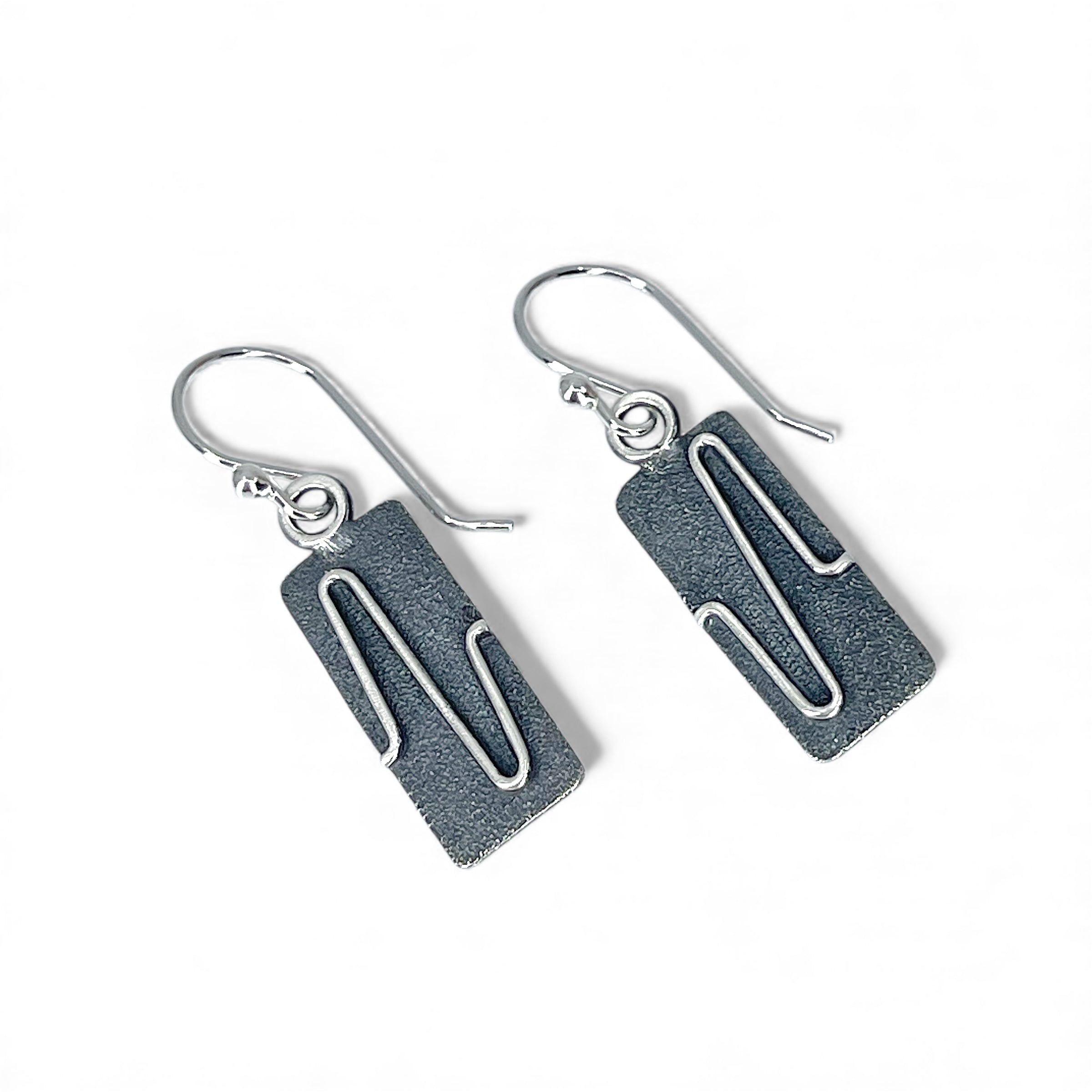 Sterling Silver earrings with a black patina and bright lines