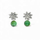 Sterling silver post earrings with floral tops and chrysoprase beads on a white background