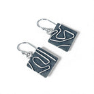 Sterling Silver earrings with geometric pattern on a white background